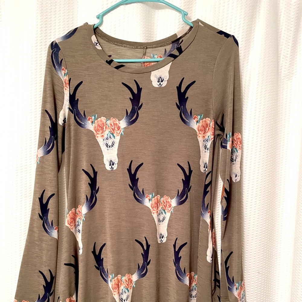 White Daisy Boutique. Size small but runs medium